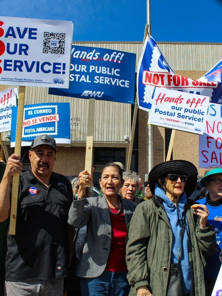 Photo: Deb joins members of the Postal Workers Union on the picket lines