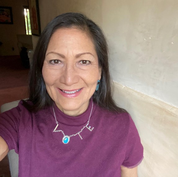 Deb wearing her VOTE necklace.
