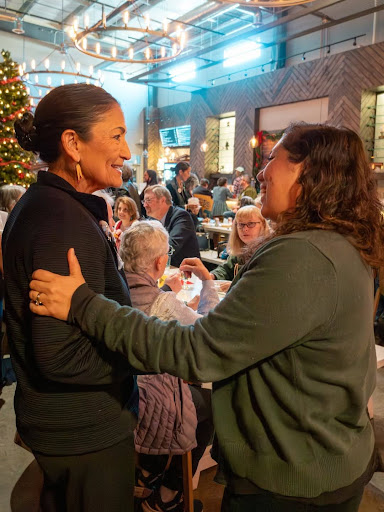 Deb Haaland engaged in conversation